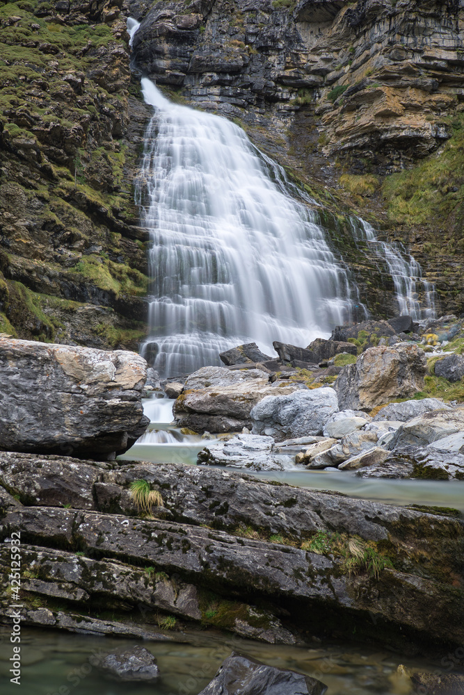 Cola de Caballo waterfall in Ordesa y Monte Perdido National Park, in the Aragonese Pyrenees, located in Huesca, Spain. Cola de Caballo waterfall in Ordesa y Monte Perdido National Park, in the Aragonese Pyrenees, located in Huesca, Spain.