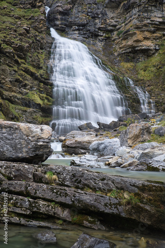 Cola de Caballo waterfall in Ordesa y Monte Perdido National Park, in the Aragonese Pyrenees, located in Huesca, Spain.