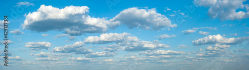 panorama of clouds against the blue sky. Background, wallpaper. Gradient tran...
