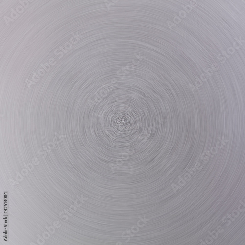 Circle of brushed aluminum metal in defocused blur motion abstract background © tab62