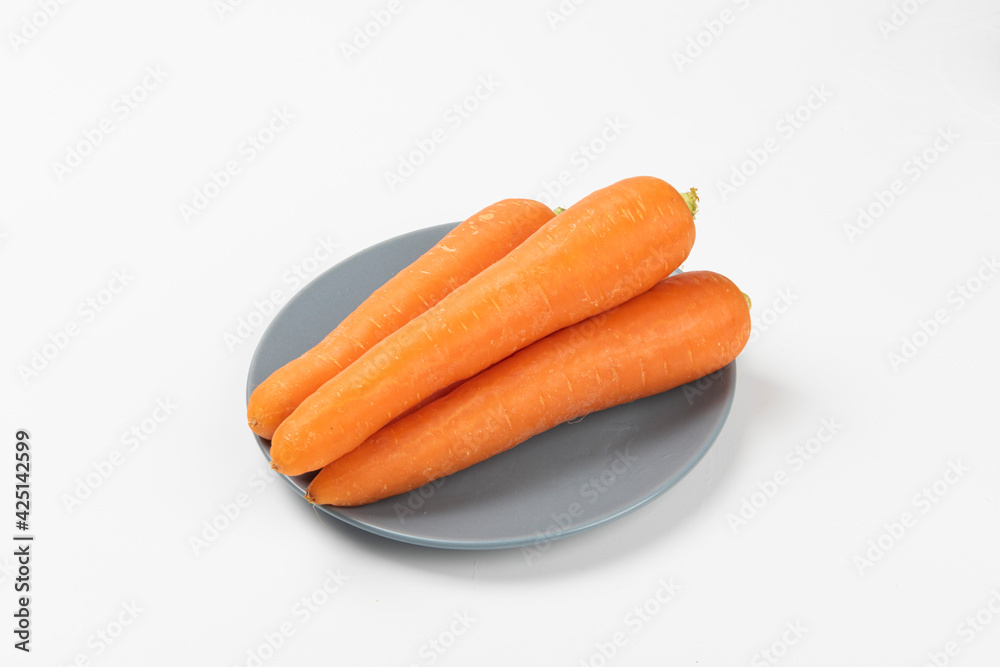 Fresh carrots isolated on white background Fresh carrots isolated on white background