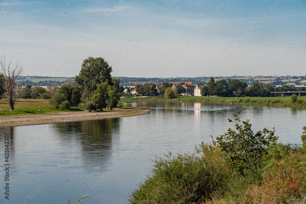 View of Elbe river with nature scenery in the background View of Elbe river with nature scenery in the background