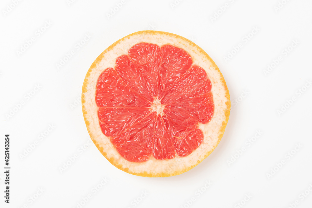 a sliced of fresh grapefruit fruit .Food concept background. a sliced of fresh grapefruit fruit .Food concept background.