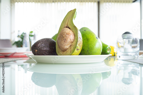 traditional colombian food avocado on the table in the dinningroom photo