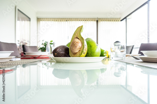 traditional colombian food avocado on the table in the dinningroom	 photo