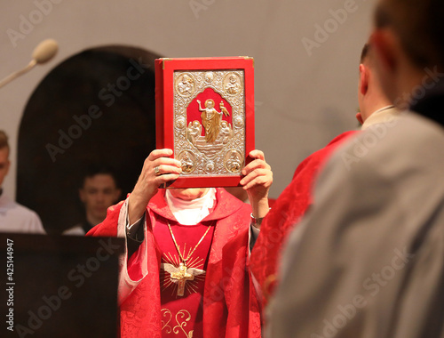 The bishop provides the Sacrament of Confirmation  photo