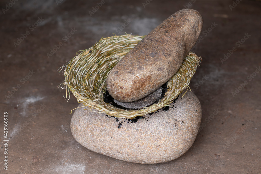 Primitive mortar and pestle Primitive mortar and pestle