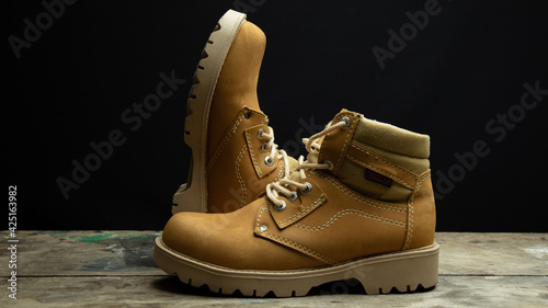 mustard colored boots with work or fashion style