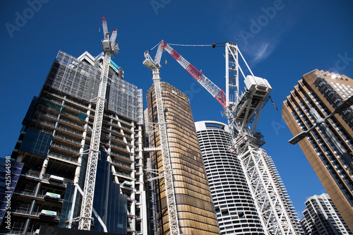 Photography Tall commercial real estate tower building development construction blue sky cra