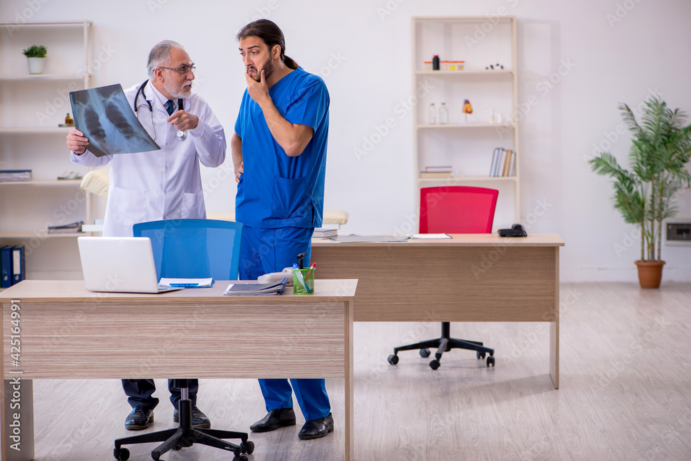 Fototapeta premium Two doctors working in the clinic