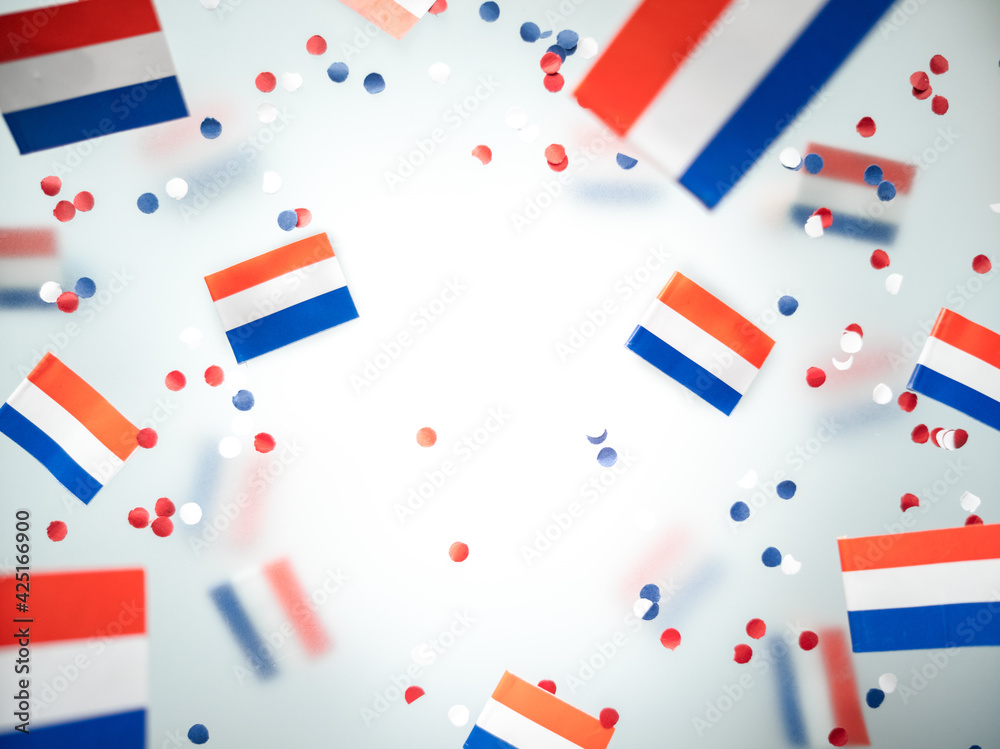 Netherlands King's birthday, liberation day. flags on a foggy background. The concept of freedom, patriotism and memory. National Unity and Solidarity Day Netherlands King's birthday, liberation day. flags on a foggy background. The concept of freedom, patriotism and memory. National Unity and Solidarity Day