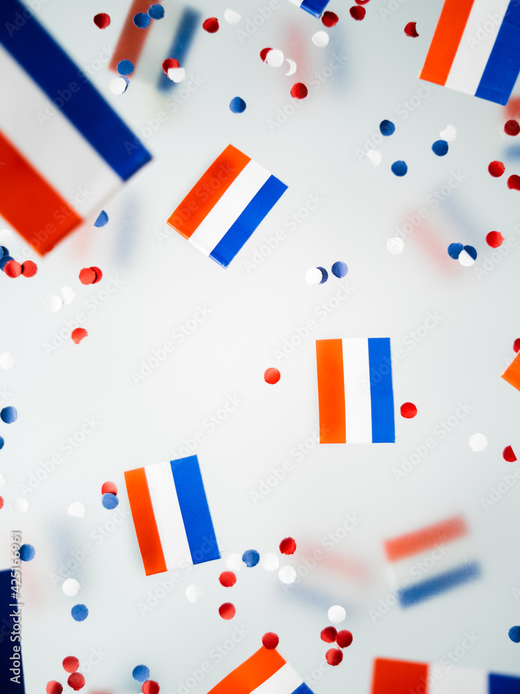 Netherlands King's birthday, liberation day. flags on a foggy background. The concept of freedom, patriotism and memory. National Unity and Solidarity Day Netherlands King's birthday, liberation day. flags on a foggy background. The concept of freedom, patriotism and memory. National Unity and Solidarity Day