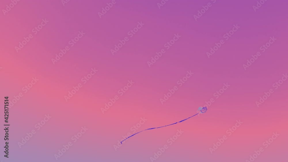 Blue kite silhouette flying in pink sky. Abstract concept of blue kite flying on multicolored sky.

