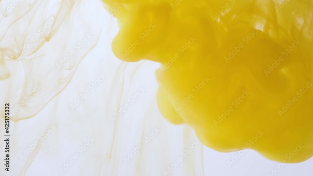 drop yellow ink paint in water 