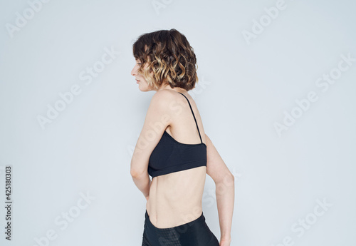 sports woman fitness yoga meditation model light background