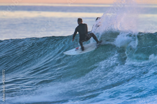 Surfing at Rincon point in California in winter