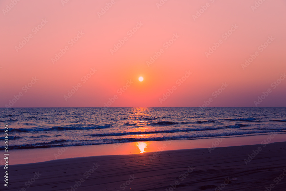 Nature in twilight period which including of sunset over the sea and the nice beach , Sunset and beach background