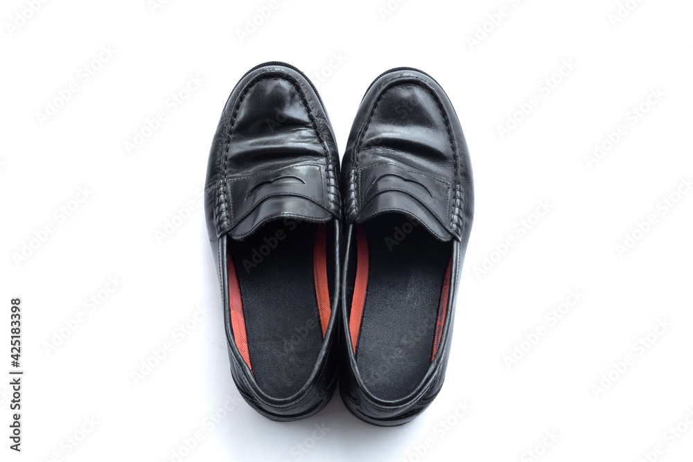 Black penny loafer shoes with isolate on white background Black penny loafer shoes with isolate on white background