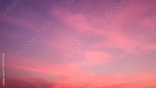 Abstract idyllic winter frosty orange and purple sky,background texture of colorful sunset. Twilight sky © kaw