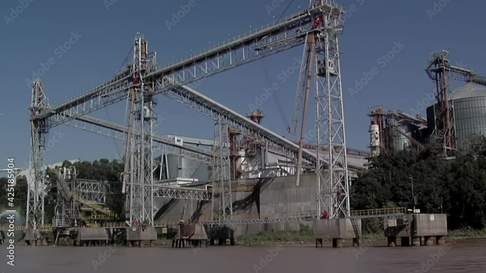 Port Facility for Grains, Oilseeds and Pulses, Grain Elevator, Silos and Industrial Terminal in the Port of Rosario, Santa Fe Province, Argentina. Port Facility for Grains, Oilseeds and Pulses, Grain Elevator, Silos and Industrial Terminal in the Port of Rosario, Santa Fe Province, Argentina.