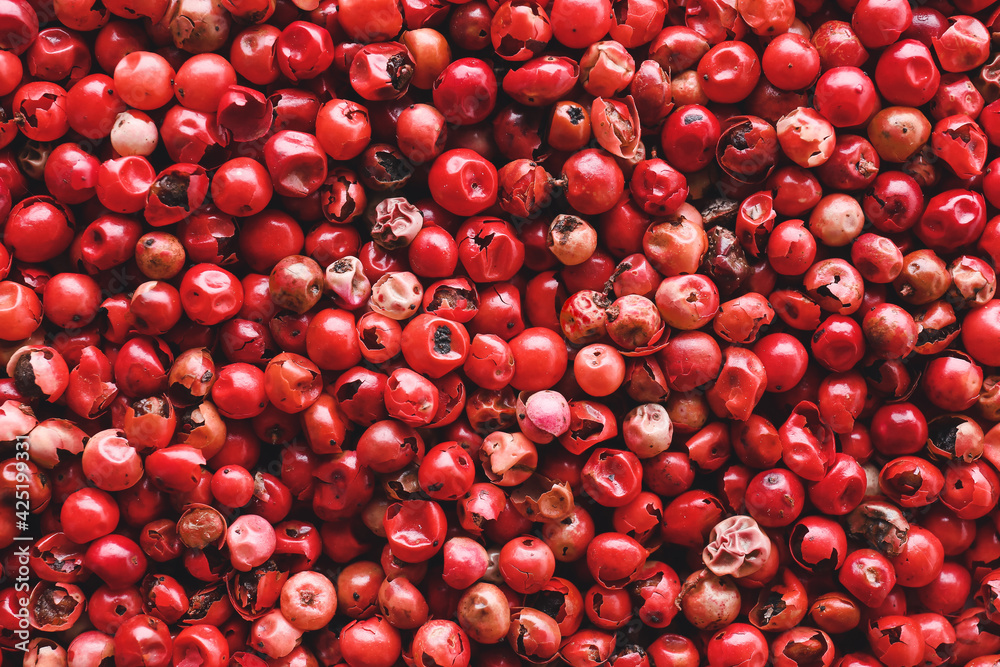 Texture of red peppercorns as background Texture of red peppercorns as background