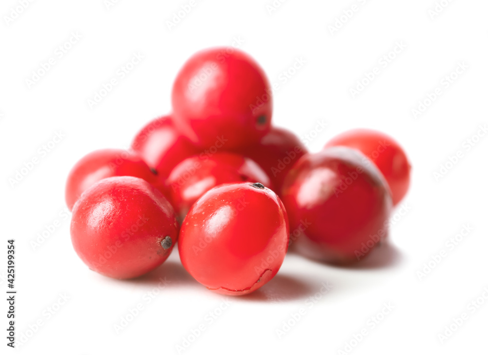 Red peppercorns on white background Red peppercorns on white background