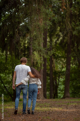couple walking in forest
