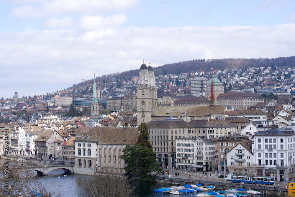 Fototapeta premium Church great minster (German Grossmünster) at the old town of Zurich. Photo taken April 3rd, 2021, Zurich, Switzerland.