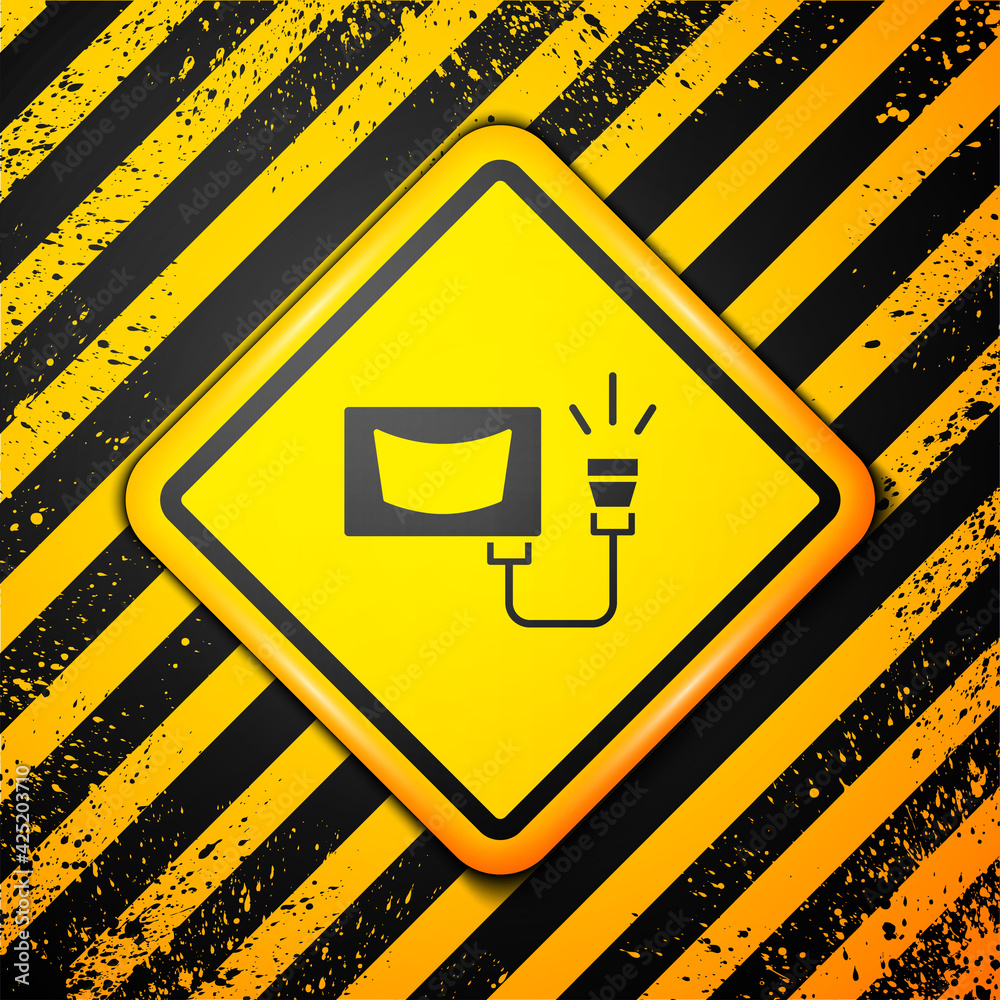 Black Ultrasound icon isolated on yellow background. Medical equipment. Warning sign. Vector