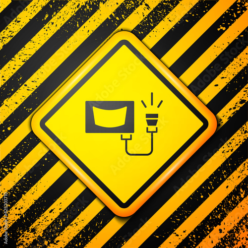Black Ultrasound icon isolated on yellow background. Medical equipment. Warning sign. Vector