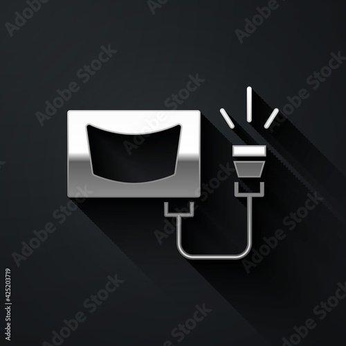 Silver Ultrasound icon isolated on black background. Medical equipment. Long shadow style. Vector