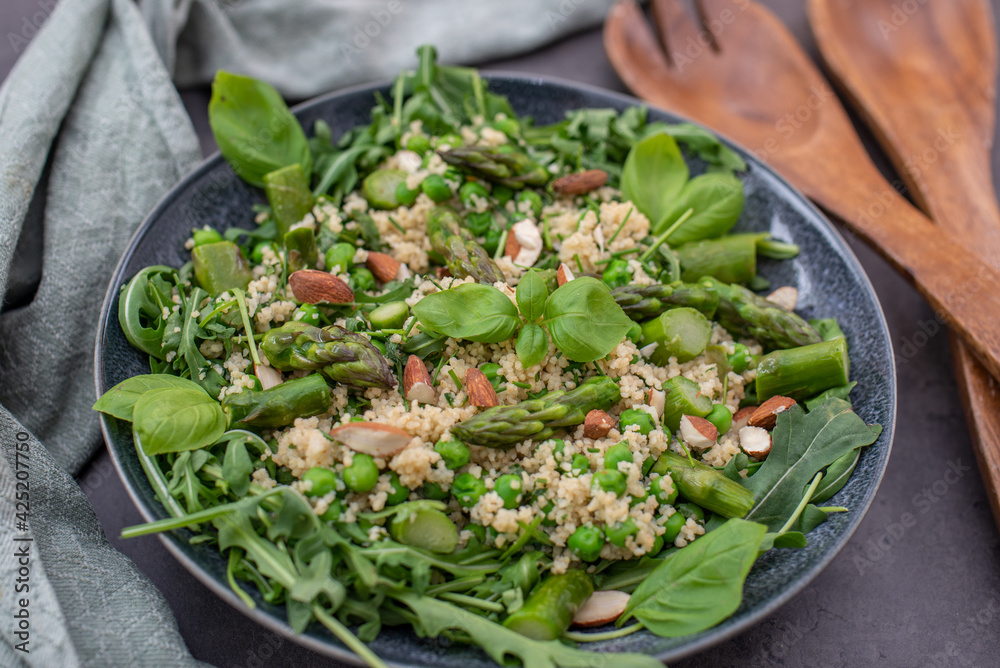 healthy spring couscous salad with asparagus and herbs