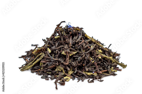 Heap of dry tea on white background.