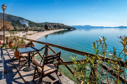 Fototapeta Naklejka Na Ścianę i Meble -  High angle view of Abovos beach in Afissos, a traditional village built amphitheatrically on the slopes of Mount Pelion, with view to the Pagasetic Gulf. In Thessaly, Greece.