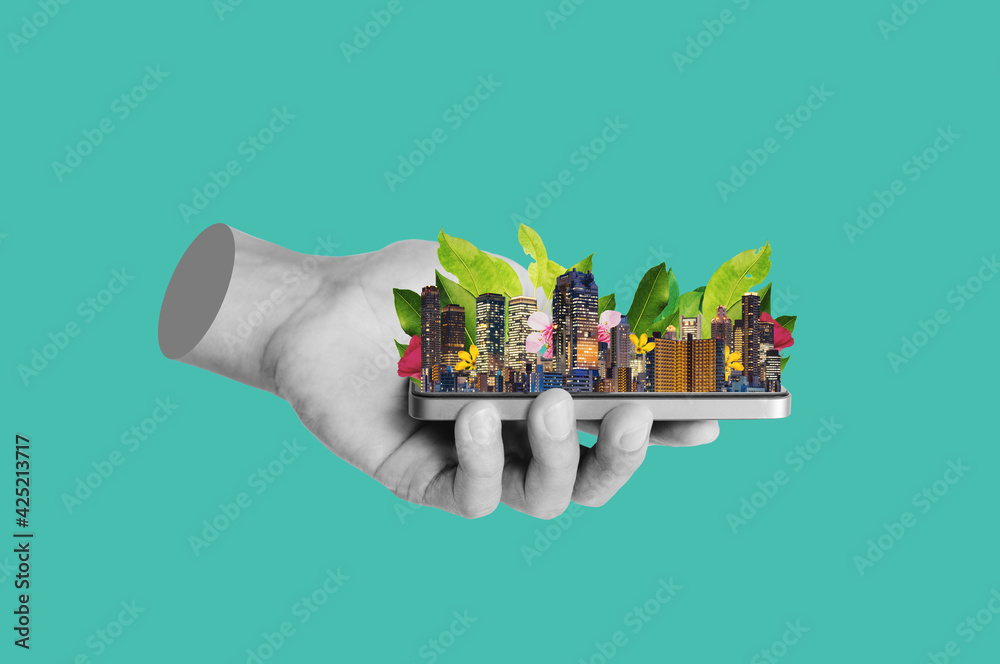 Digital collage modern art. Hand holding modern buildings with leaves and flower - obrazy, fototapety, plakaty 