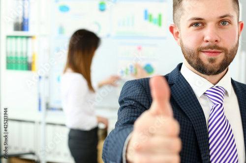 Smiling man in modern building photo