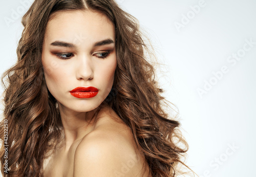 Woman model hairstyle makeup curls eye shadow portrait