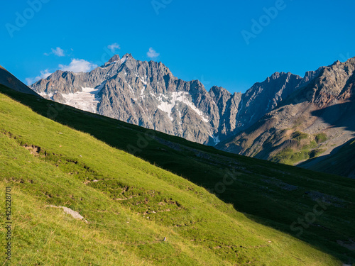 Mountain landscape on the french Alps, Massif des Ecrins. Scenic rocky mountains at high altitude with glacier