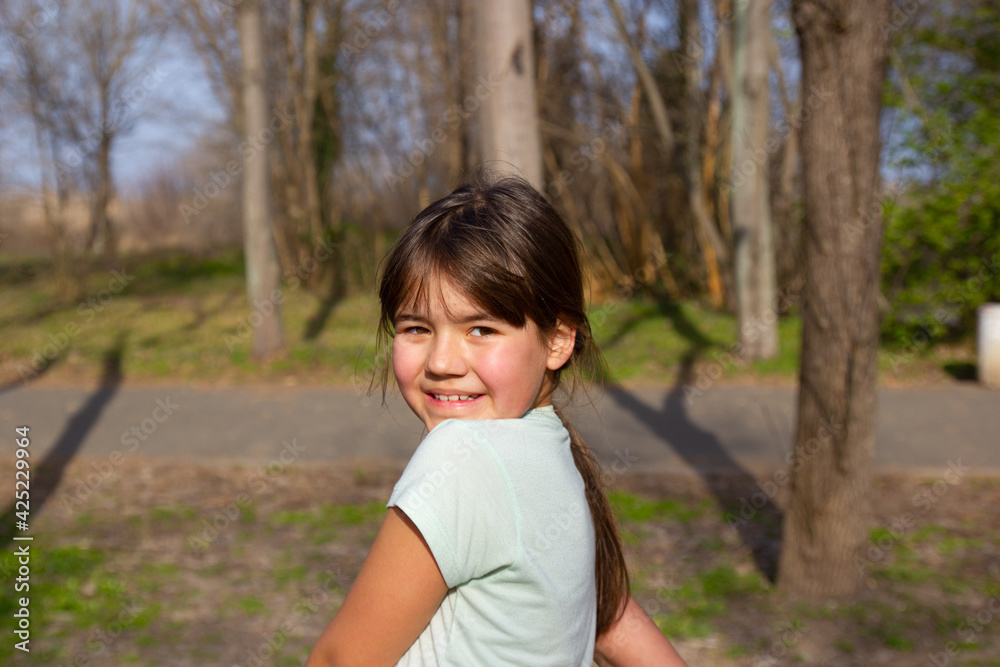 Cheerful smiling child girl on a sunny day Cheerful smiling child girl on a sunny day