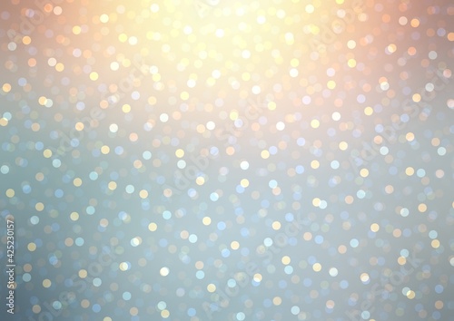Shimmering bokeh in bright shine on top. Blue yellow colors. Empty background for winter holidays design.