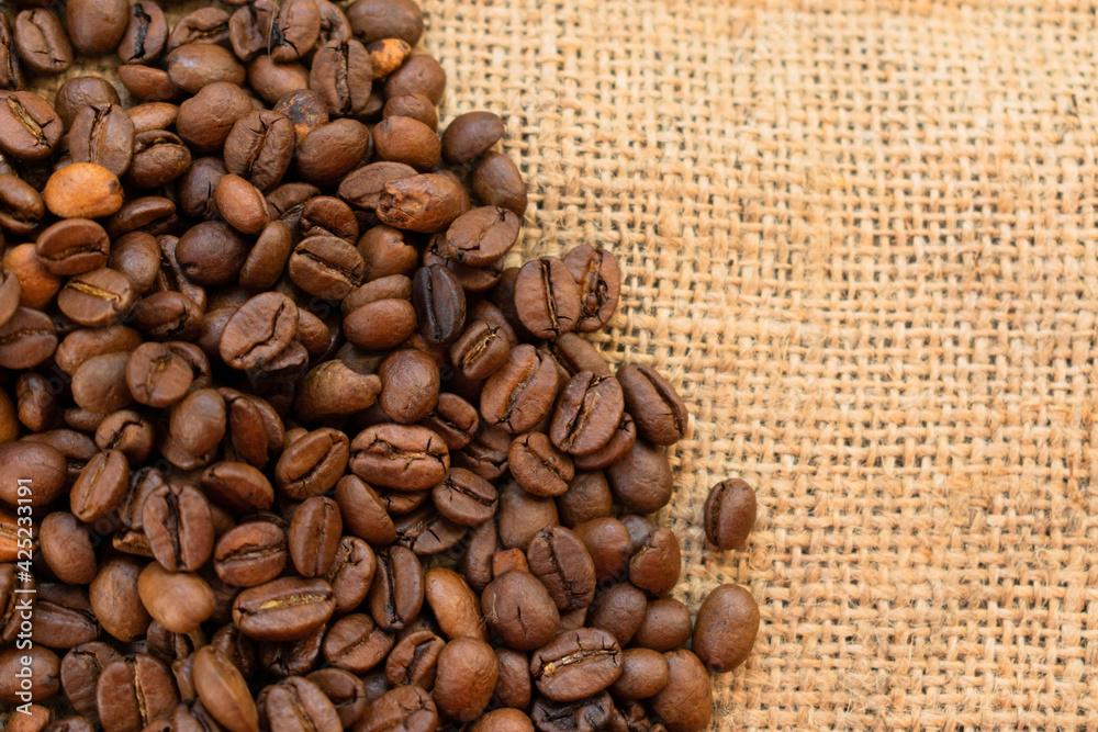 Background from coffee beans.Many roasted coffee coffees. Copy space. Background from coffee beans.Many roasted coffee coffees. Copy space.