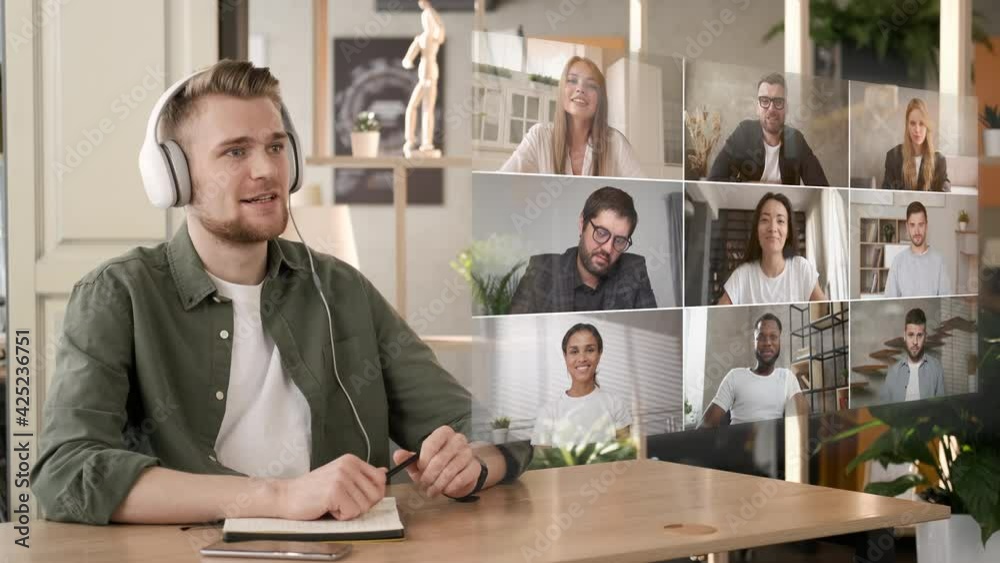Future is now. Man discussing project online. Group video call. Remote communication happy multiracial young people. Working modern home office technology augmented reality. Business chat conference
