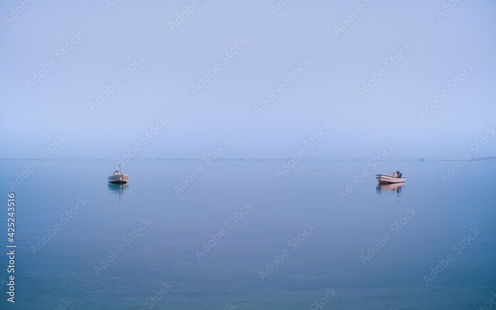 boats in blue water