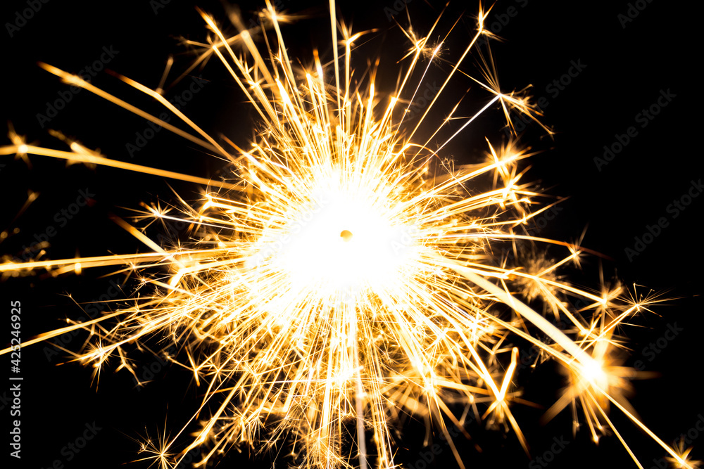 Sparkler burning with dark background. Abstract fire burning background