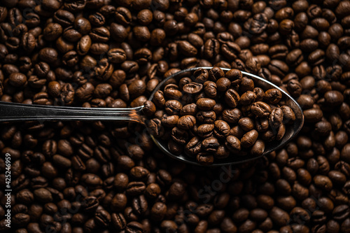 coffee beans in a spoon