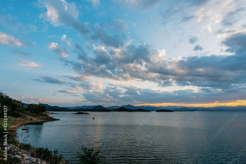 beautiful blue sky lake view high peak jungle mountains green river forest at Kaeng Krachan dam National Park, Phetchaburi, Thailand.