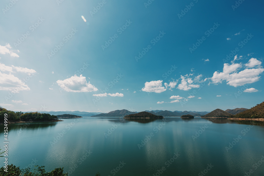 beautiful blue sky lake view high peak jungle mountains green river forest at Kaeng Krachan dam National Park, Phetchaburi, Thailand. beautiful blue sky lake view high peak jungle mountains green river forest at Kaeng Krachan dam National Park, Phetchaburi, Thailand.