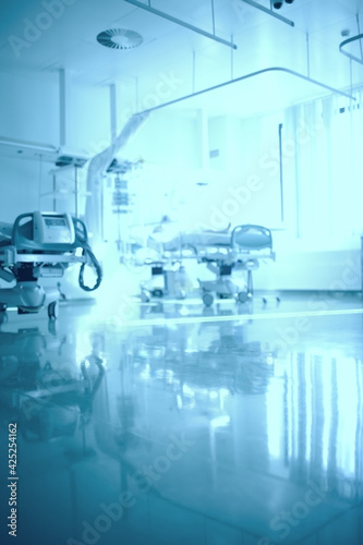 Sun-drenched large hospital ward