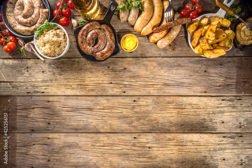 фотографія Assortment of different fried sausages