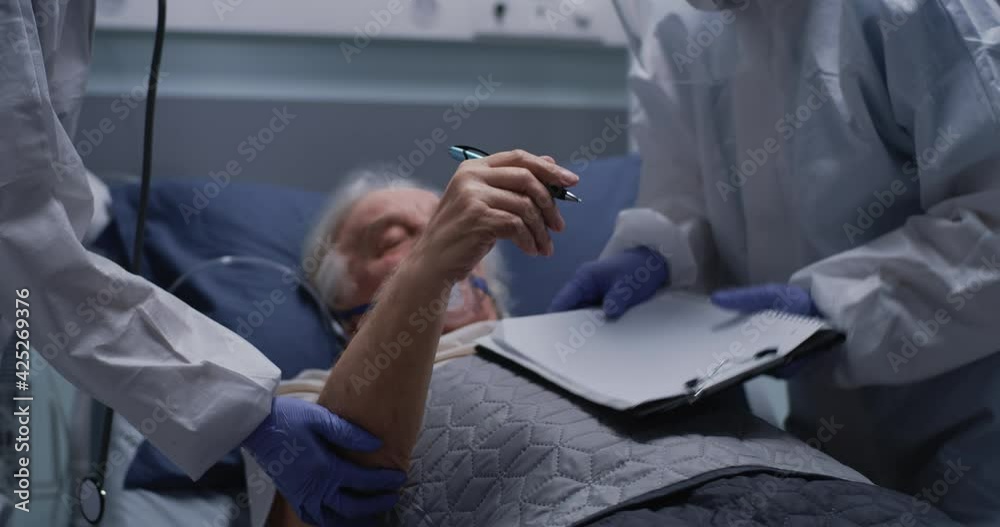 Senior man writing message to crop doctors